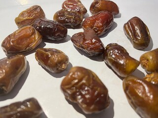 some delicious dried dates isolated on white background. Arabic food