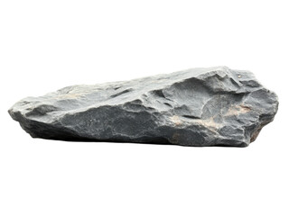 Rough, unpolished rock with a jagged surface, set against a black background.