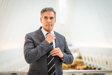 Senior corporate businessman wearing elegant suit in New York