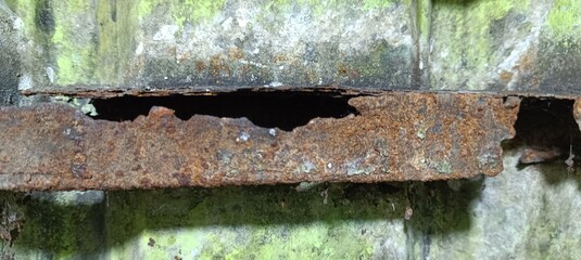 Steel that experiences corrosion or rust due to lack of maintenance