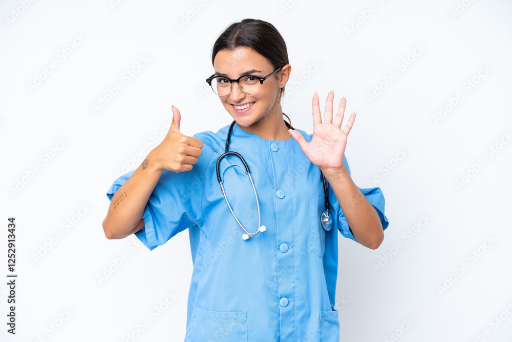 Poster Young nurse woman isolated on white background counting six with fingers