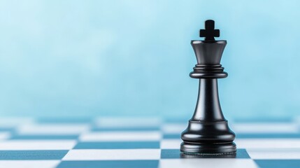 Black chess piece positioned on a blue and white checkered board background for competitive intelligence concept