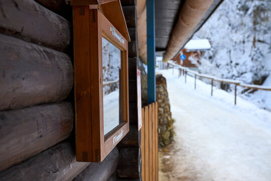 Charming Wooden Lodge on a Winter Day