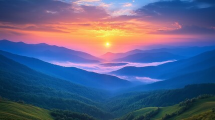 Fototapeta premium Majestic Sunrise Over Rolling Hills and Misty Valleys in Nature