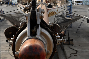 Top of the bowsprit of a white sailing vessel in Aganlar Marina and shipyard located in Bodrum. It...