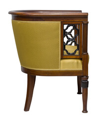 Elegant, classic armchair with a barrel back, isolated on a white background. Wooden frame with...