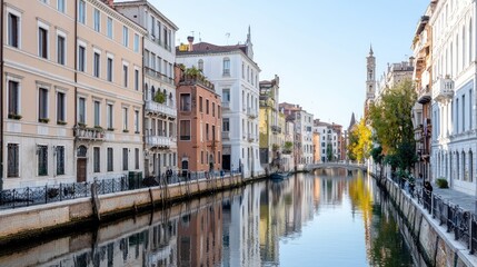 Calm Venetian canal, colorful buildings, clear sky, peaceful morning, travel imagery