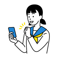 スマートフォンの画面を見てガッツポーズをする女子学生