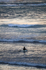 Fototapeta premium surfer at sunset