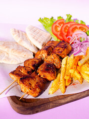 grilled chicken breast ,grilled chicken breast with vegetables, 
shish kebab, barbecue, meat, pitta 