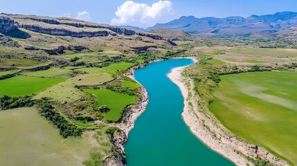 Turquoise River Winding Through Green Valley