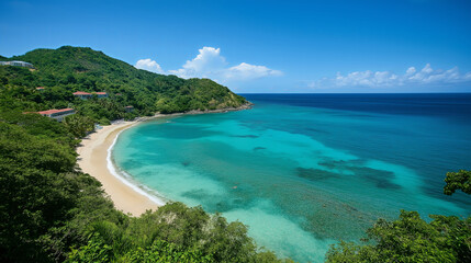 A breathtaking view of the ocean with crystal-clear turquoise waters and soft white sand.