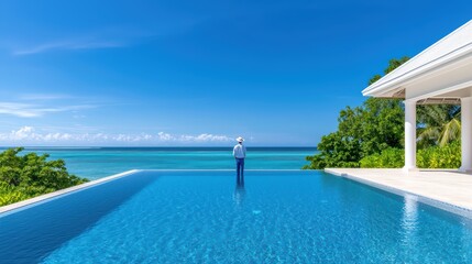 Fototapeta premium Tranquil Paradise with Infinity Pool Overlooking Vibrant Ocean Views