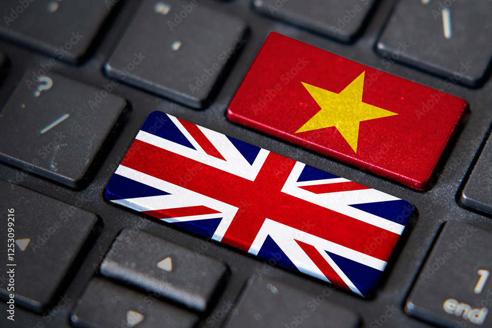 Poster uk and vietnam flags on computer keyboard