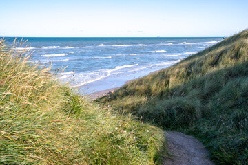 Stunning North Sea coastline with waves in Hirtshals, Denmark, during summer