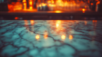 Empty countertop, defocused bar with alcohol bottles in the background