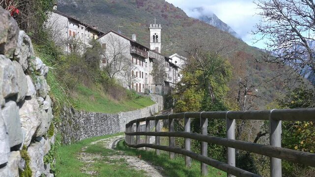 walking towards the ancient village of erto in italy
