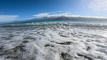 Action cam placed in the surf of the sea in the Strait of Messina