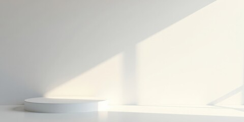 Fototapeta premium A minimalist white circular pedestal in a sunlit room with a blank wall, ideal for product display or presentation.