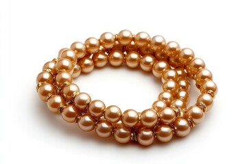 Elegant golden pearl bracelets arranged in a stylish manner perfect for fashion accessories or jewelry marketing and advertising photography