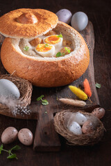 Tasty sour soup served in bread for Easter.