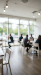 Blurred Cafe Scene: People, Tables, and Chairs in a Light, Modern Setting, Ideal for Backgrounds and Creative Projects.