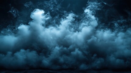 Abstract blue smoke swirling in dark atmospheric background with soft glow