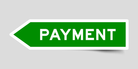 Green color arrow shape sticker label with word payment on gray background