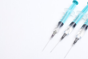 Disposable plastic syringe prepared for injection and vaccination in the hospital. The concept of...