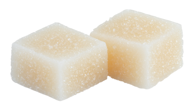 Two sugar cubes covered in granulated sugar on transparent background