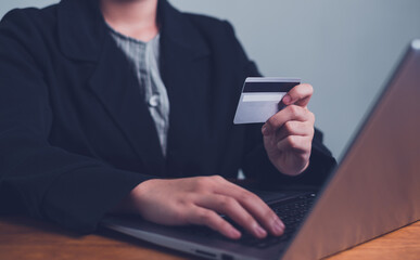 online shopping concept. hands holding credit card and using smart phone. shopping online payment by using smart phone.