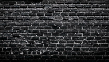 wide panoramic view of old shabby black brick wall with grunge textures and dark masonry elements