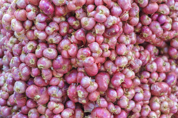Fresh Red Shallots Piled Togethe