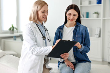 Woman having appointment with doctor in hospital