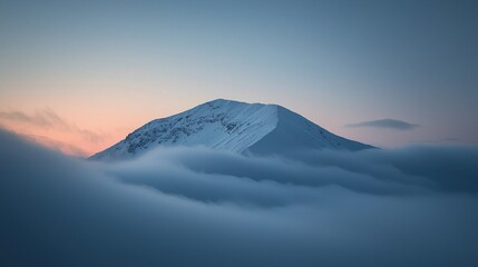 Snowy mountain peak emerging from thick clouds, illuminated by the soft glow of the setting sun, grand and majestic