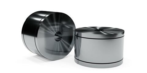 Two rolled shiny steel plate coils standing and laying on white background