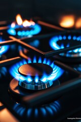 Close-up of gas burners on a stove. Cooking, flames, energy