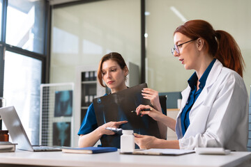 Medical Team Using Digital Tablet for Healthcare, Doctor Technology, X-Ray Analysis.
