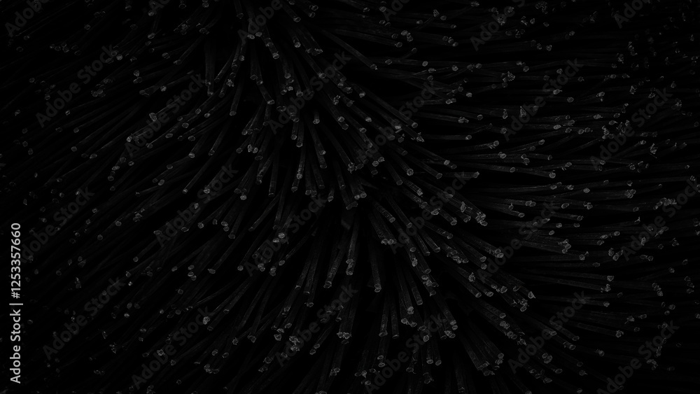 Poster Black textured background of a bunch of black wires. The wires are arranged in a way that they look like they are growing out of the ground, creating a sense of depth and dimension