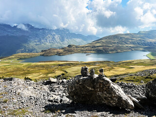 Fototapeta premium The alpine lake Tannensee or Tannen Lake in the Uri Alps mountain massif, Kerns - Canton of Obwalden, Switzerland (Kanton Obwald, Schweiz)