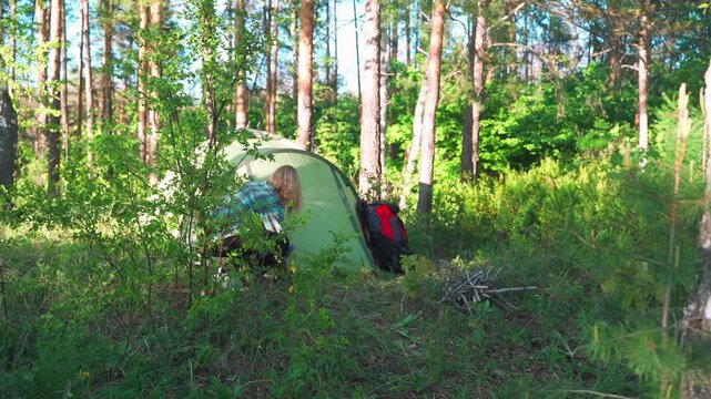 Woman alone on a hike in the forest