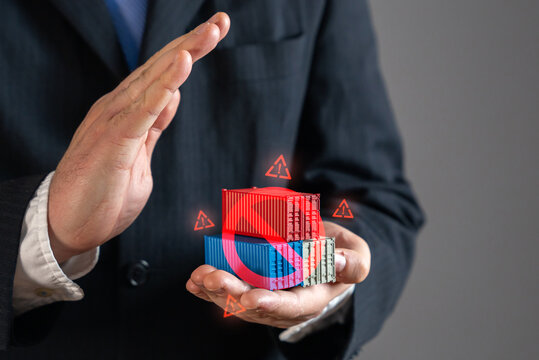 The businessman is wary of sanctioned, dangerous and illegal cargo. Customs regulations, smuggling risks, import-export restrictions, security concerns, compliance, financial penalties