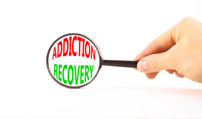 Addiction recovery symbol. Concept words Addiction recovery on beautiful black magnifying glass....