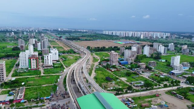 Aerial View Of The Metro Rail Trains Of Dhaka City, Docking Into agargaon Station