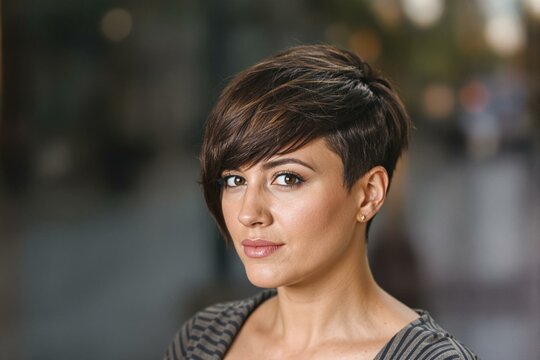 Striking Portrait of a Confident Woman with Brown Sidecut Hair