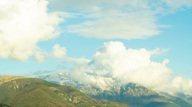 Timelapse of stunning textured sky in the mountains on the seashore