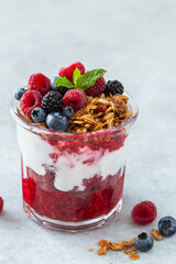 Healthy breakfast, fresh greek yogurt, granola and mixed berries