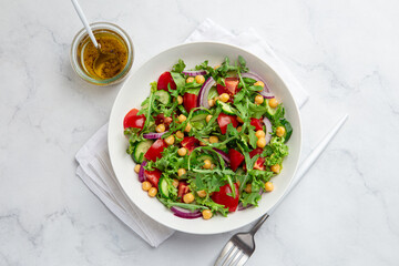 Raw vegan chickpeas and  vegetables salad
