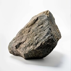 Fototapeta premium A large, rough-textured rock displayed isolated on white background