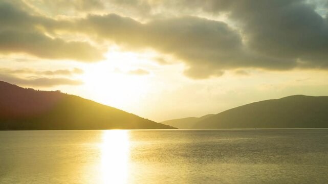 Timelapse of stunning textured sky in the mountains on the seashore